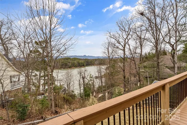 a view of a chair and tables in the patio