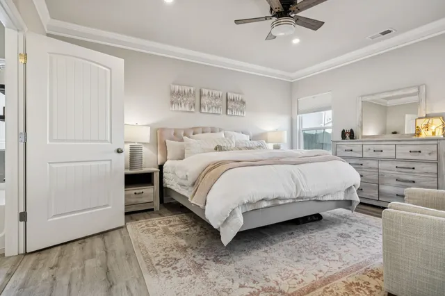 a room with a bed and a view of bedroom