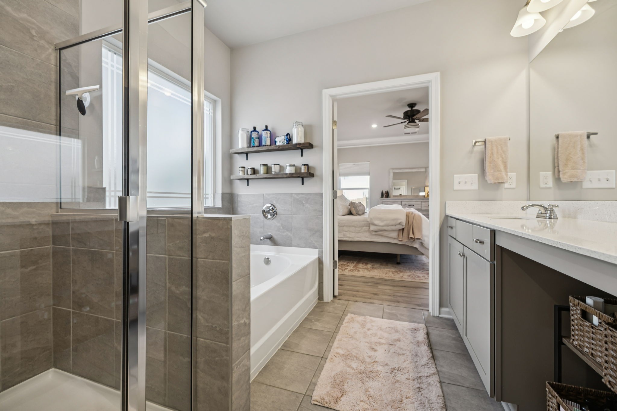 1077 Watermark Way Mount Juliet, TN 37122 - Photo 23 of 51 a en suite bathroom with a granite countertop tub sink a mirror and shower
