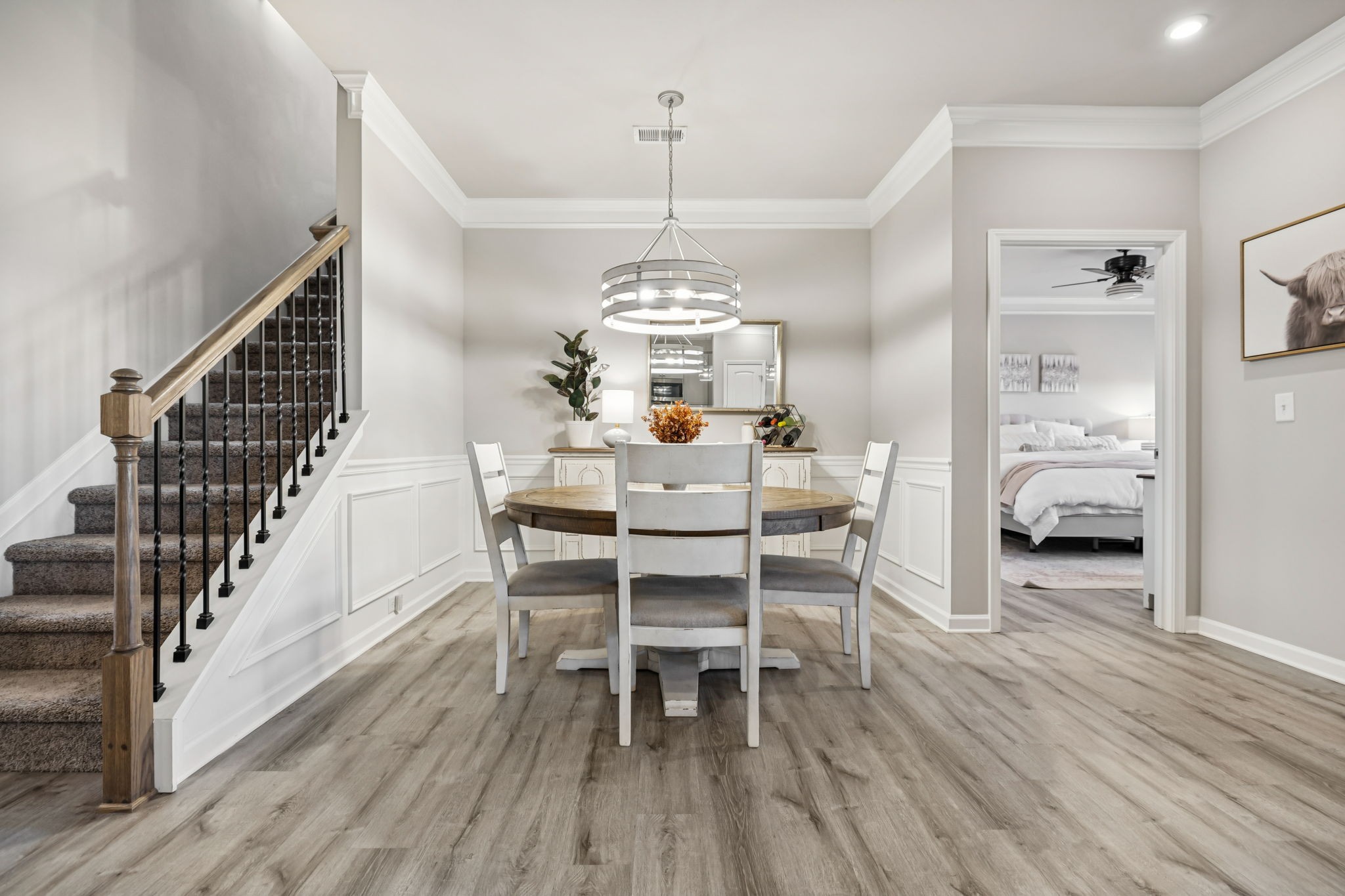 1077 Watermark Way Mount Juliet, TN 37122 - Photo 25 of 51 a view of a dining room with furniture window and wooden floor