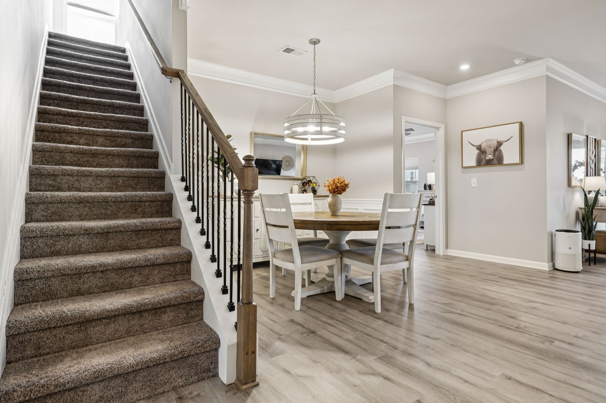 1077 Watermark Way Mount Juliet, TN 37122 - Photo 26 of 51 a view of a dining room with furniture and wooden floor