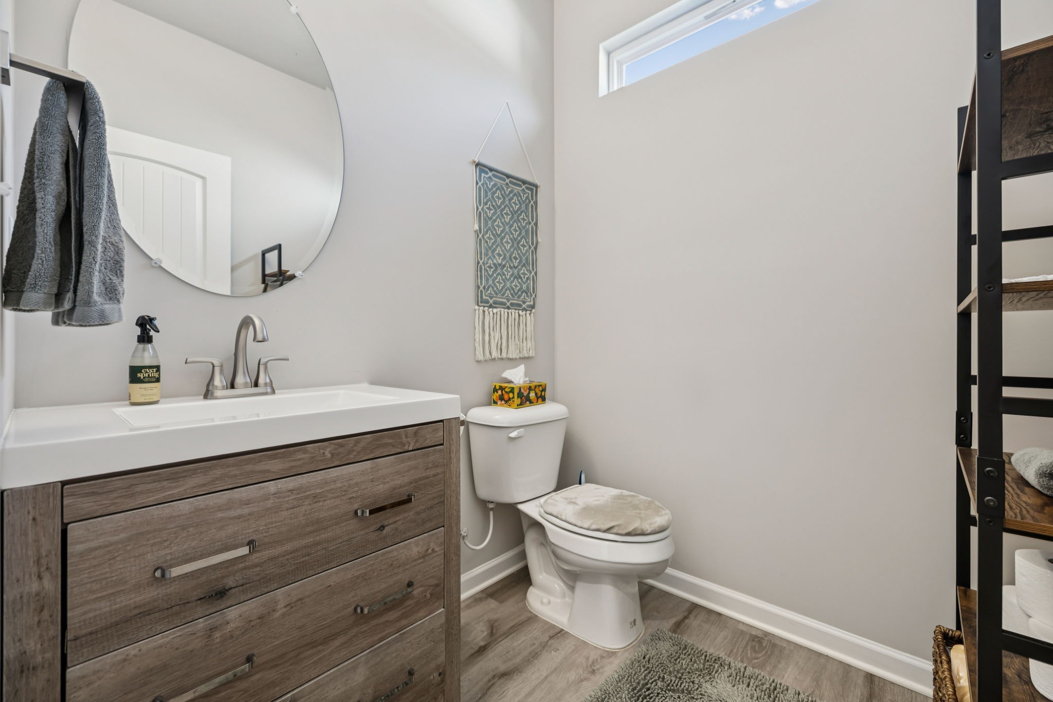 1077 Watermark Way Mount Juliet, TN 37122 - Photo 27 of 51 a bathroom with a sink a toilet and mirror