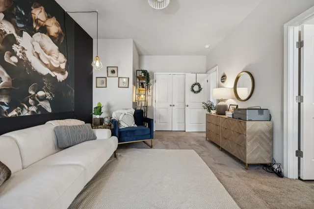 a living room with furniture and a couch