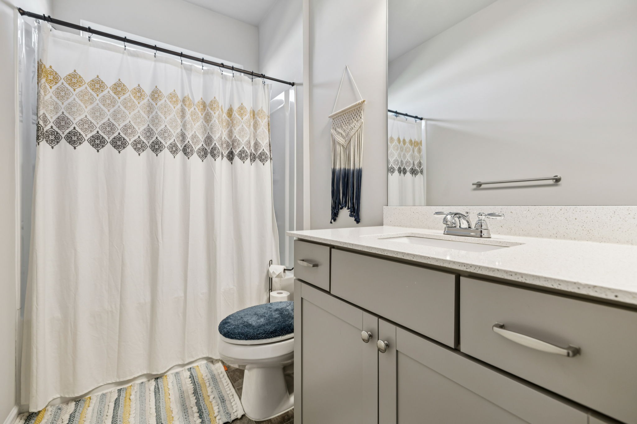 1077 Watermark Way Mount Juliet, TN 37122 - Photo 40 of 51 a bathroom with a sink a toilet and a mirror