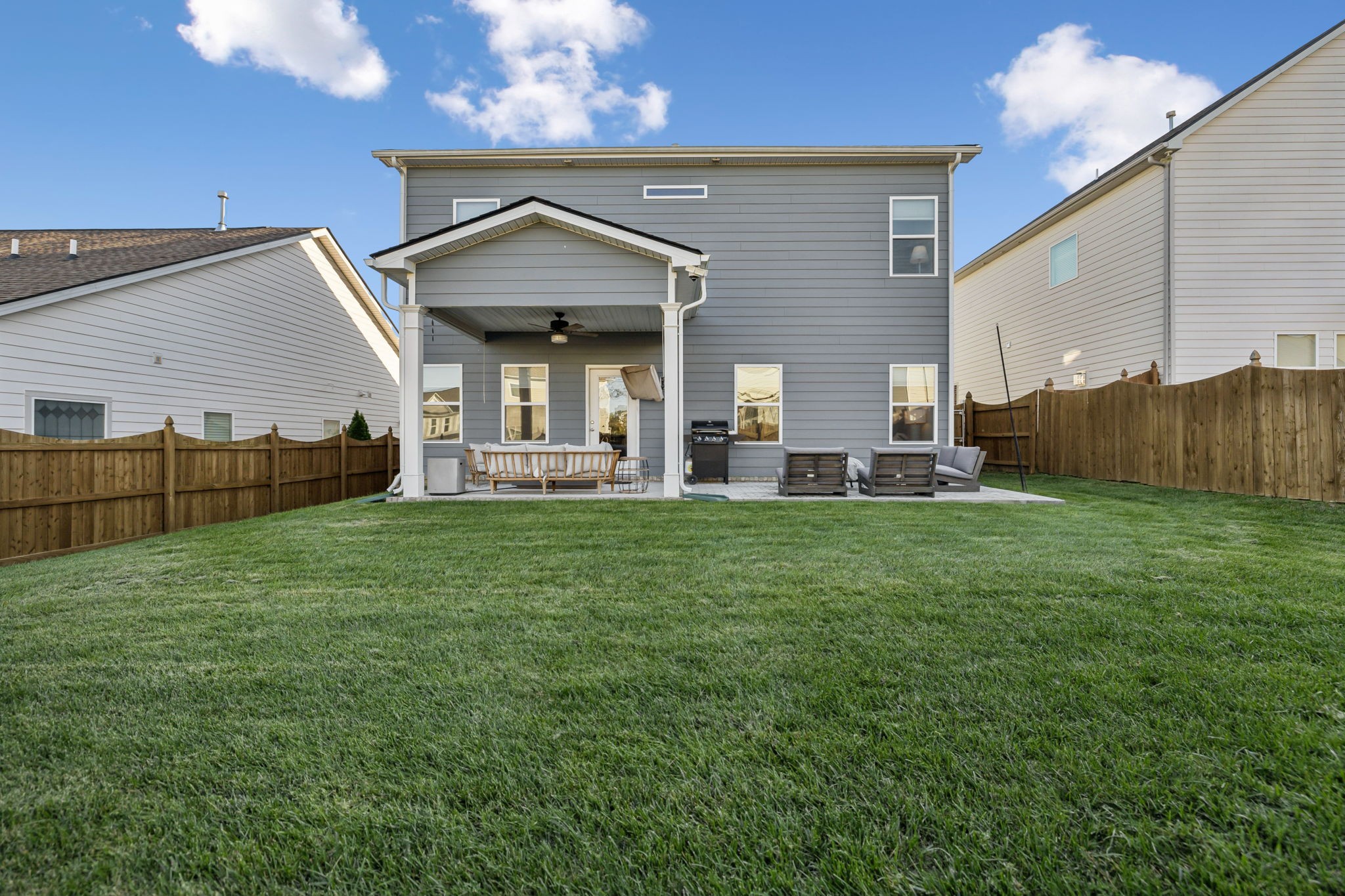 1077 Watermark Way Mount Juliet, TN 37122 - Photo 43 of 51 a view of a house with a back yard