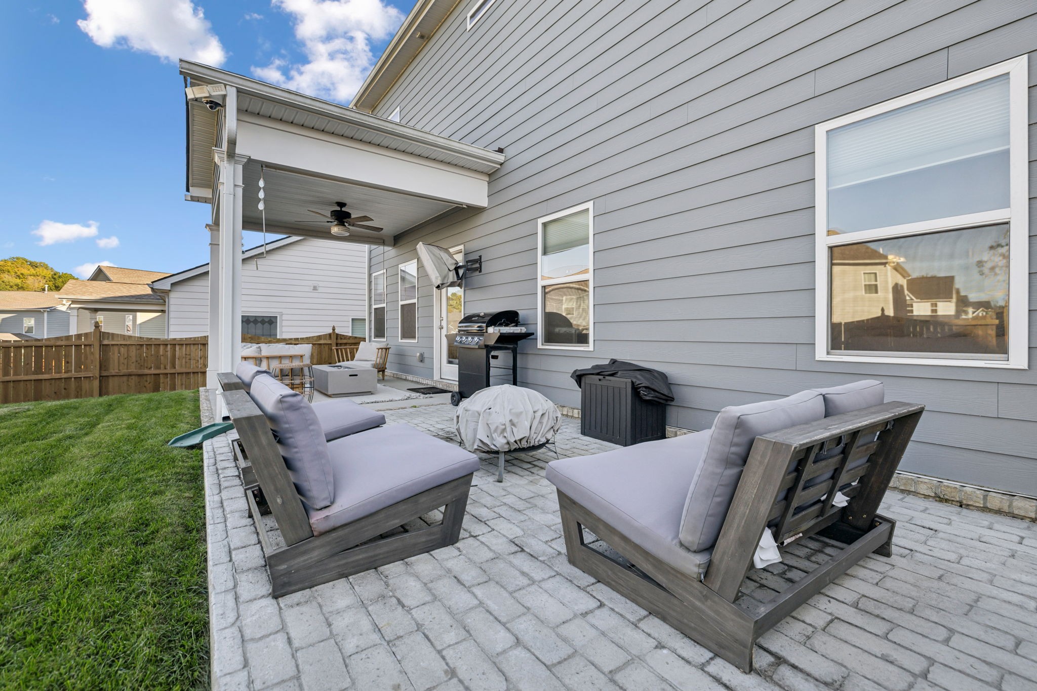 1077 Watermark Way Mount Juliet, TN 37122 - Photo 44 of 51 a view of a patio with couches chairs and a fire pit