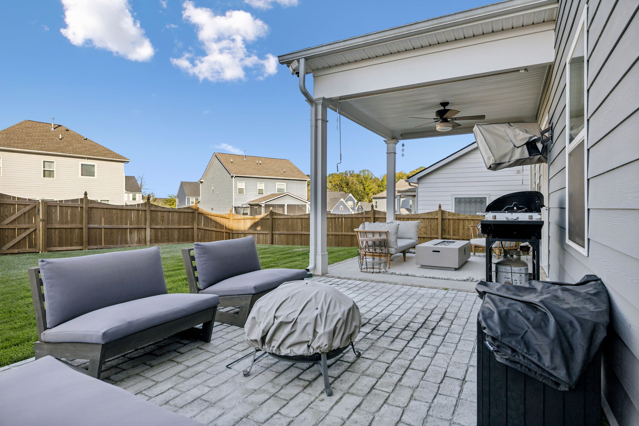 1077 Watermark Way Mount Juliet, TN 37122 - Photo 45 of 51 a bedroom with furniture and a fireplace