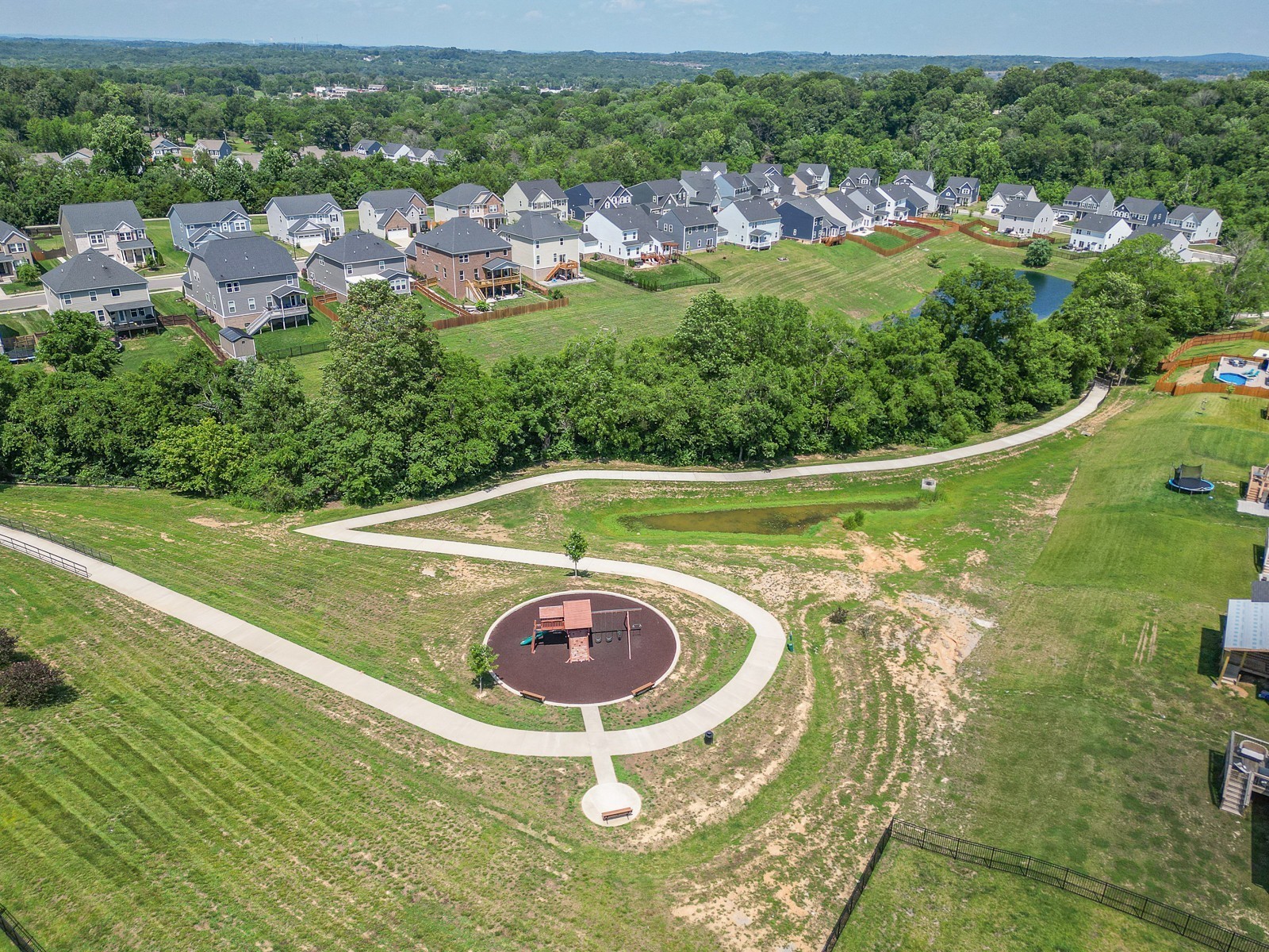 1077 Watermark Way Mount Juliet, TN 37122 - Photo 50 of 51 an aerial view of a house with a swimming pool