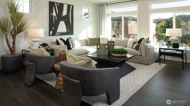 a black and white photo of a living room