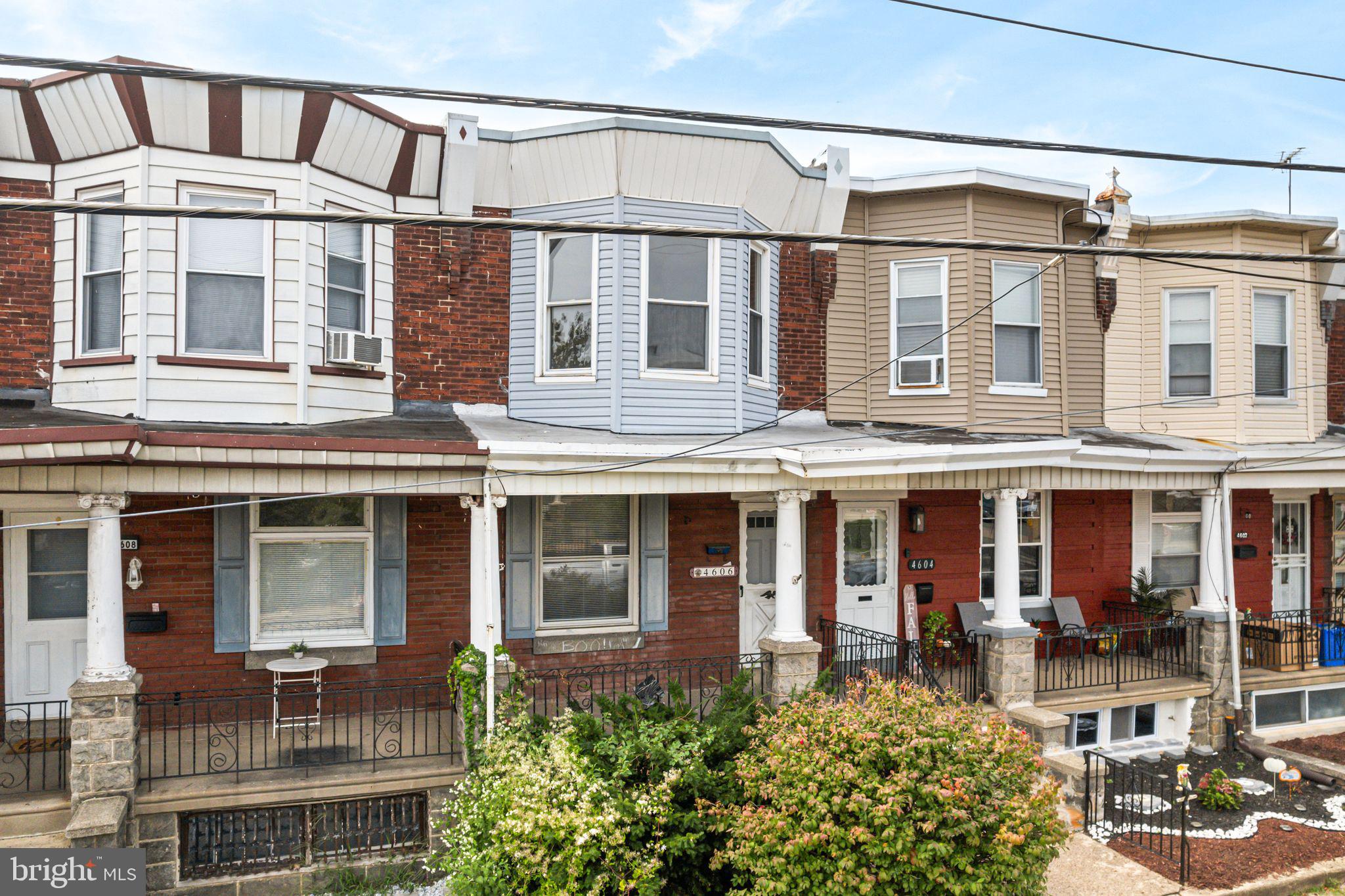4606 Benner Street Philadelphia, PA 19135 - Photo 1 of 13 front view of a building with a lot of windows