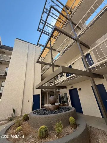 a view of roof deck with furniture