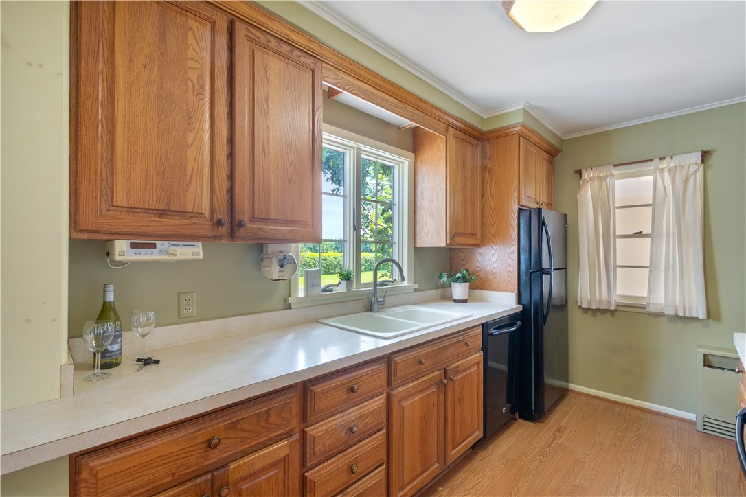 6592 Tuckahoe Road Williamson, NY 14589 - Photo 9 of 40 Lots of room to cook and bake in this kitchen! Has a great view of the rear yard too!