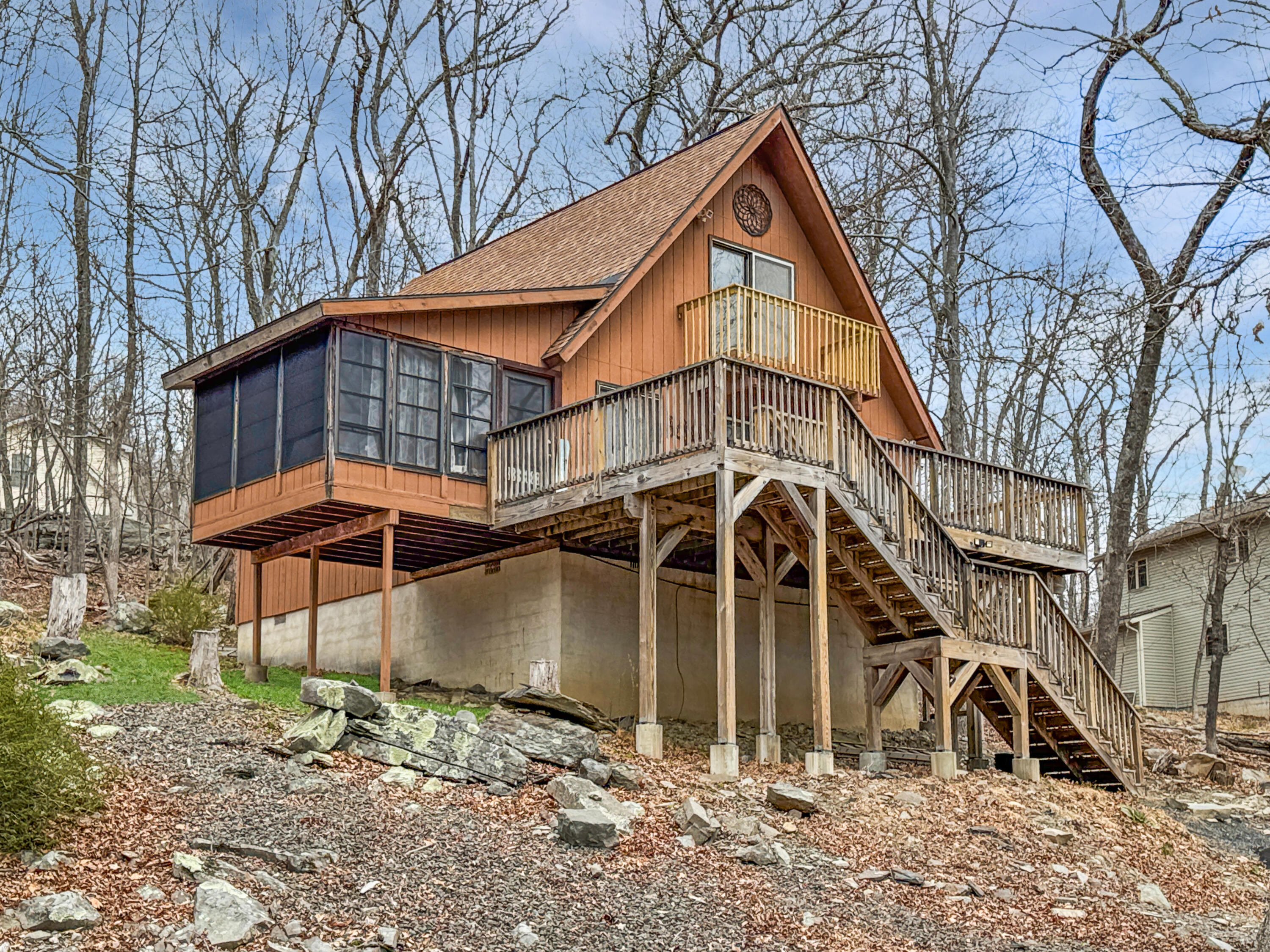 1037 Porter Drive Bushkill, PA 18324 - Photo 1 of 45 a front view of a house with parking space