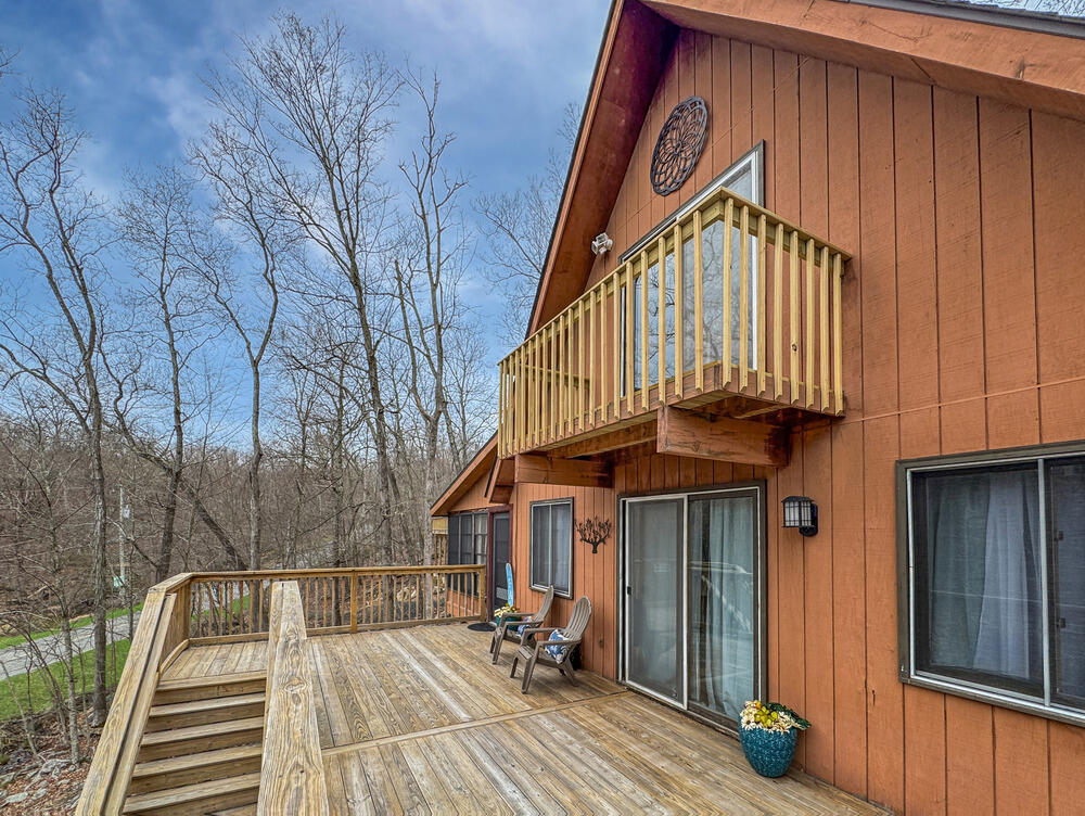 1037 Porter Drive Bushkill, PA 18324 - Photo 28 of 45 a view of wooden house with large windows