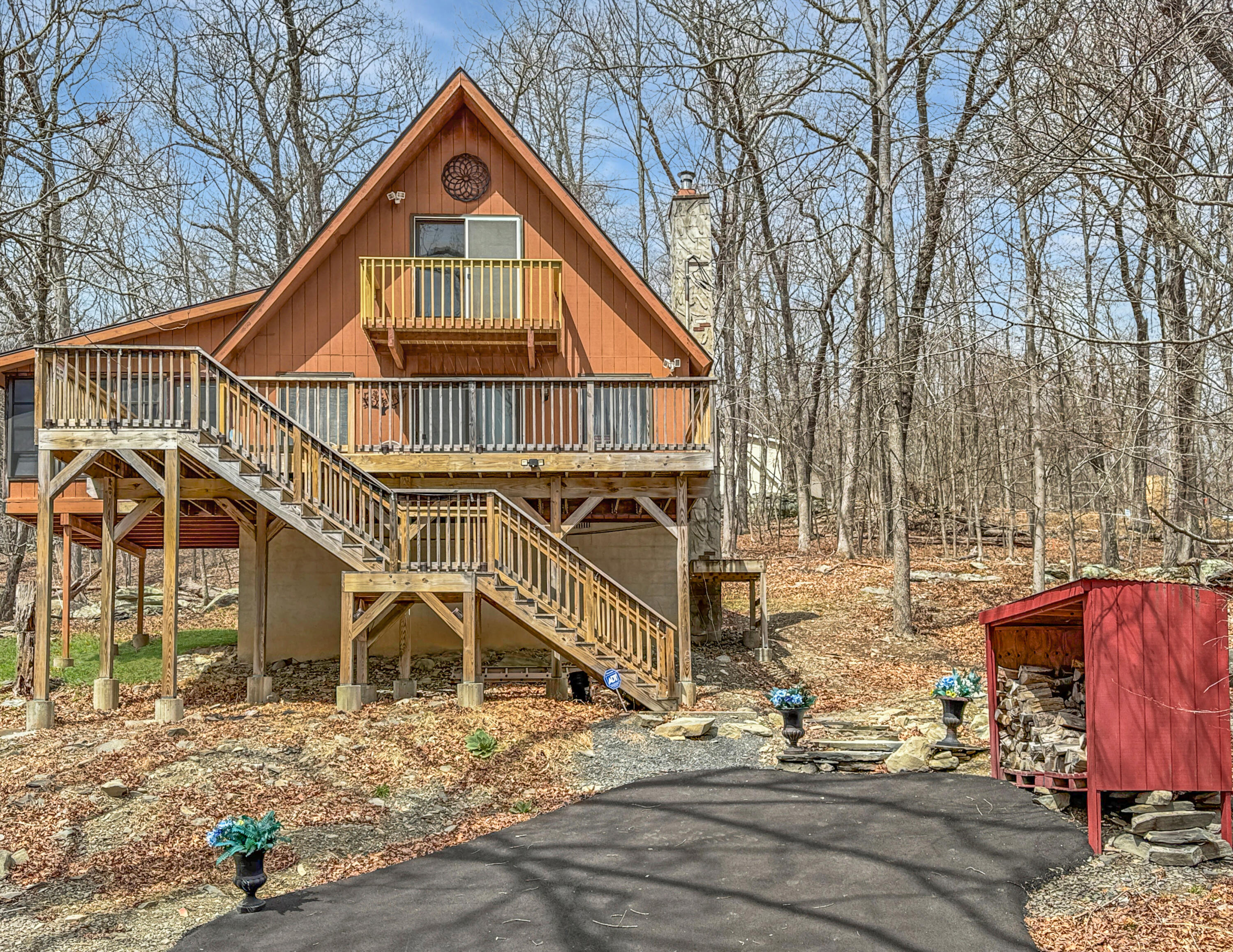 1037 Porter Drive Bushkill, PA 18324 - Photo 31 of 45 a view of a house with large windows