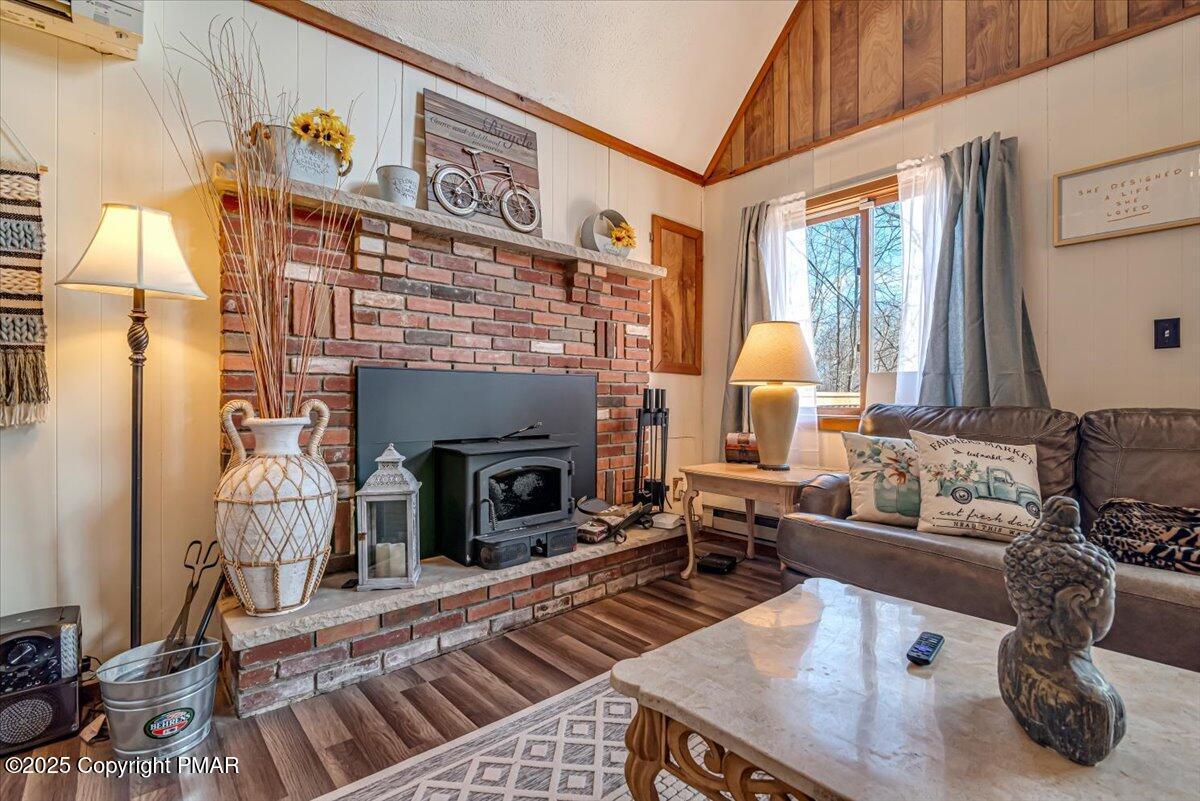 1037 Porter Drive Bushkill, PA 18324 - Photo 7 of 45 a living room with furniture and a fireplace