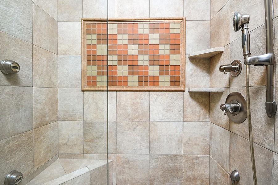 2865 Lenox Road Northeast, Unit 407 Atlanta, GA 30324 - Photo 23 of 27 a bathroom with a shower