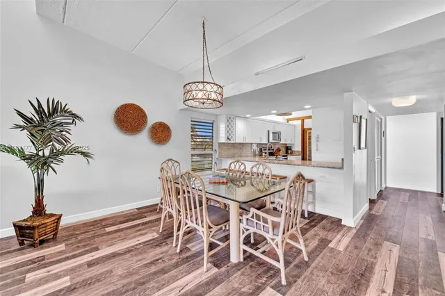 a kitchen with a stove oven and a sink