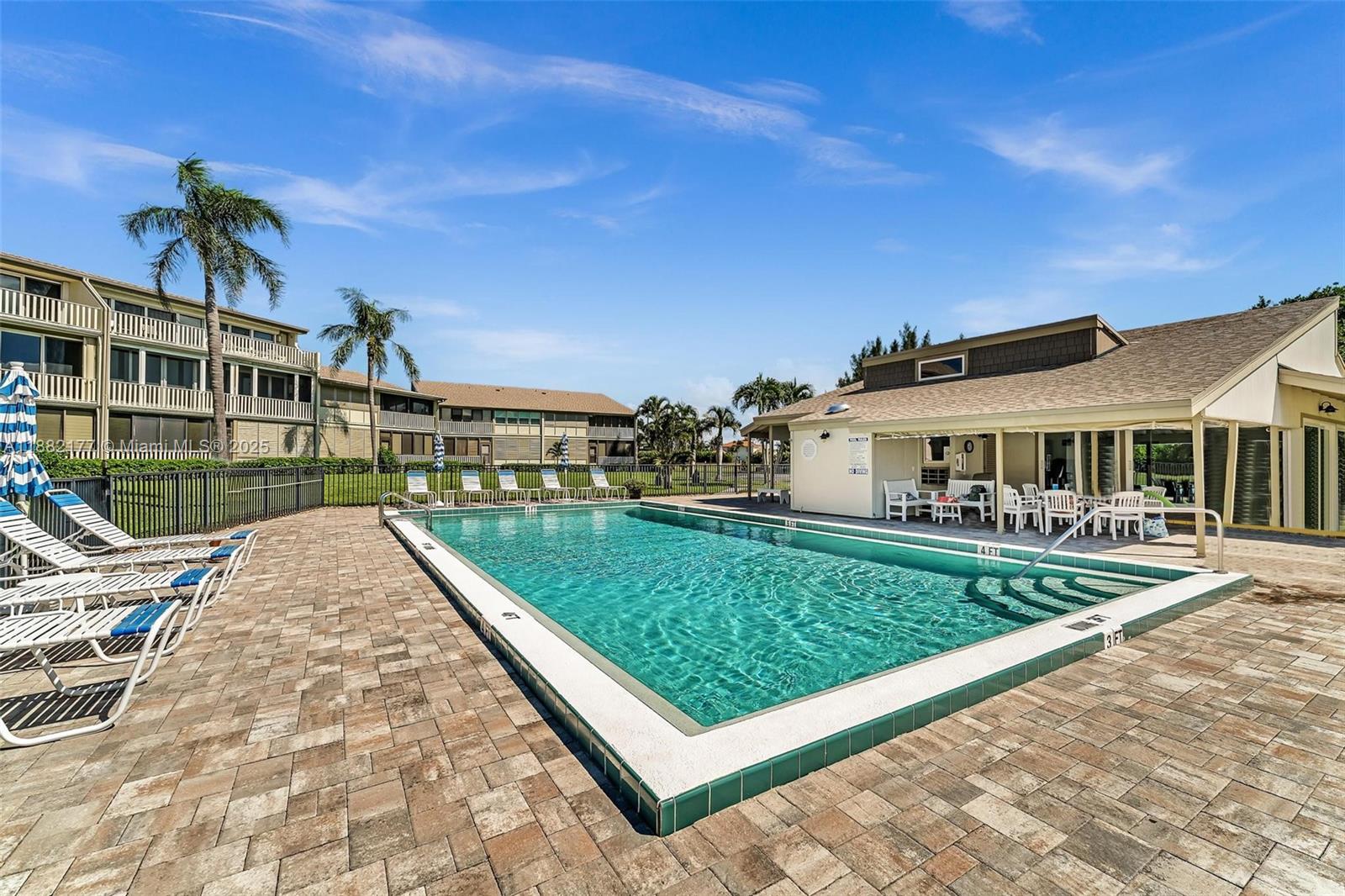 1456 Northeast Ocean Boulevard, Unit 7204 Stuart, FL 34996 - Photo 40 of 64 a view of a house with a yard