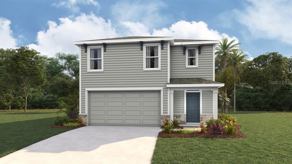 4671 Southwest 51st Terrace Gainesville, FL 32608 - Photo 1 of 15 a front view of a house with garden