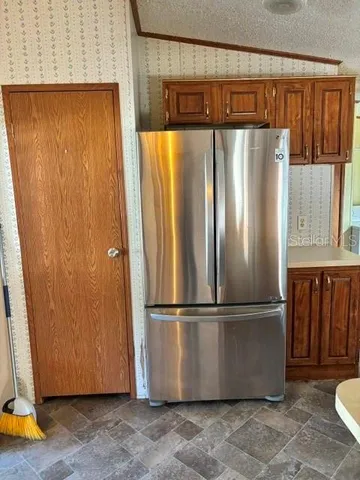 a view of a large window with wooden fence