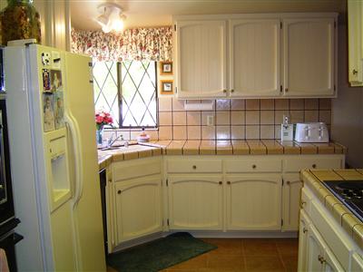 5236 Beaumont Way Santa Rosa, CA 95409 - Photo 5 of 10 a utility room with cabinets washer and dryer