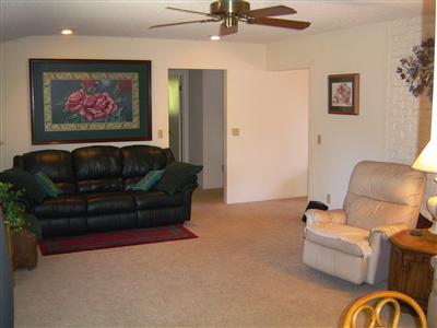 5236 Beaumont Way Santa Rosa, CA 95409 - Photo 10 of 10 a living room with furniture and a painting on the wall