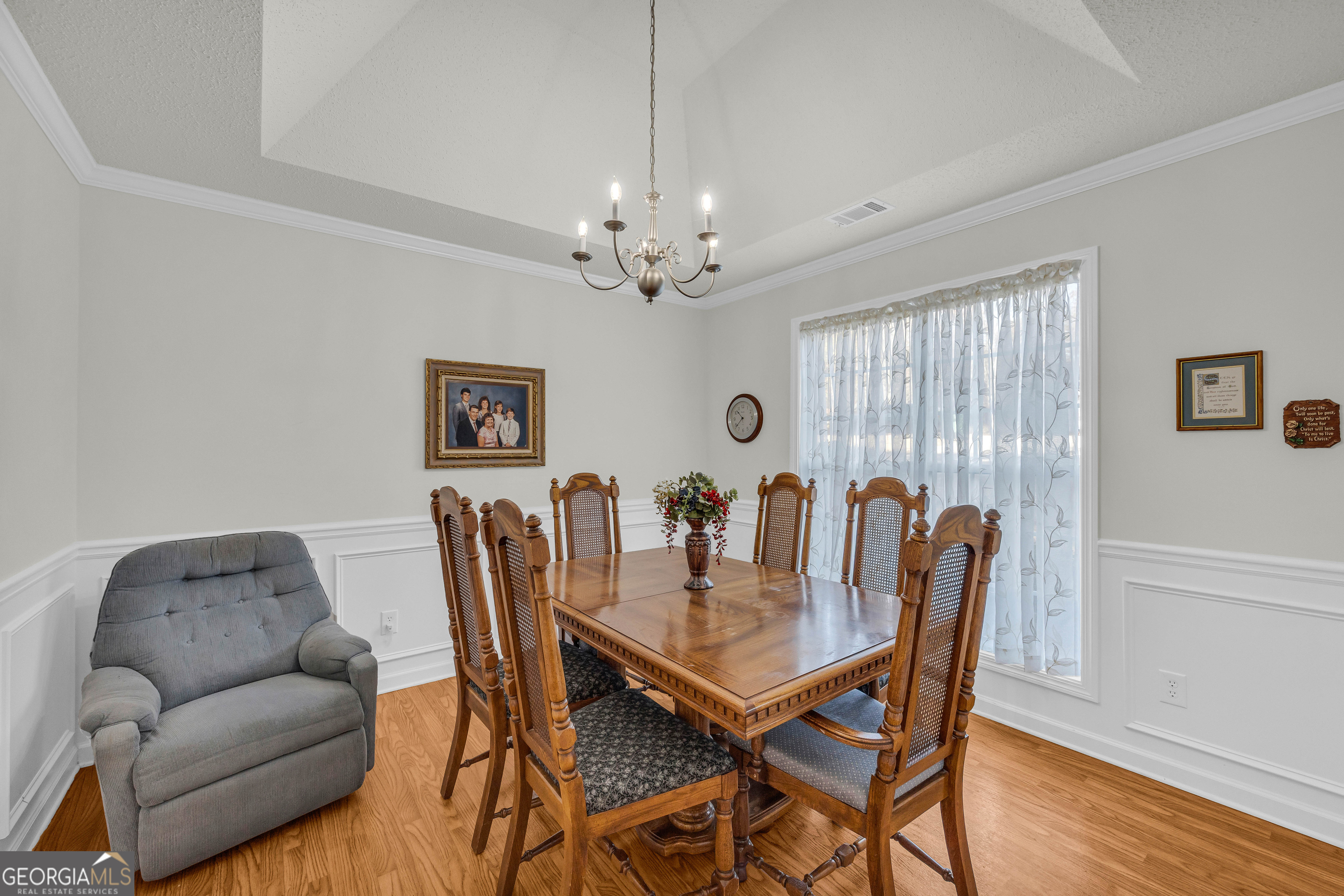 357 Sundew Lane Mount Airy, GA 30563 - Photo 13 of 53 a view of a dining room with furniture window and wooden floor