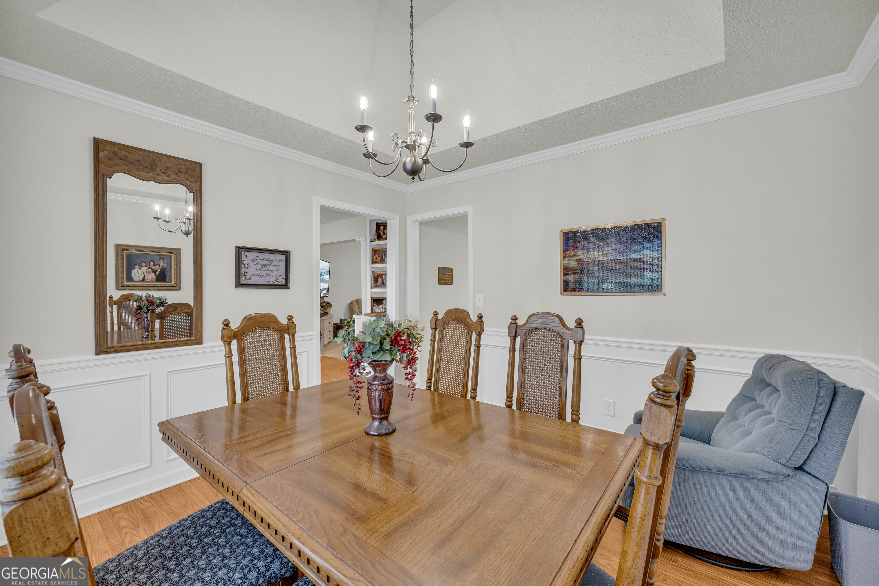 357 Sundew Lane Mount Airy, GA 30563 - Photo 15 of 53 a dining room with furniture and chandelier
