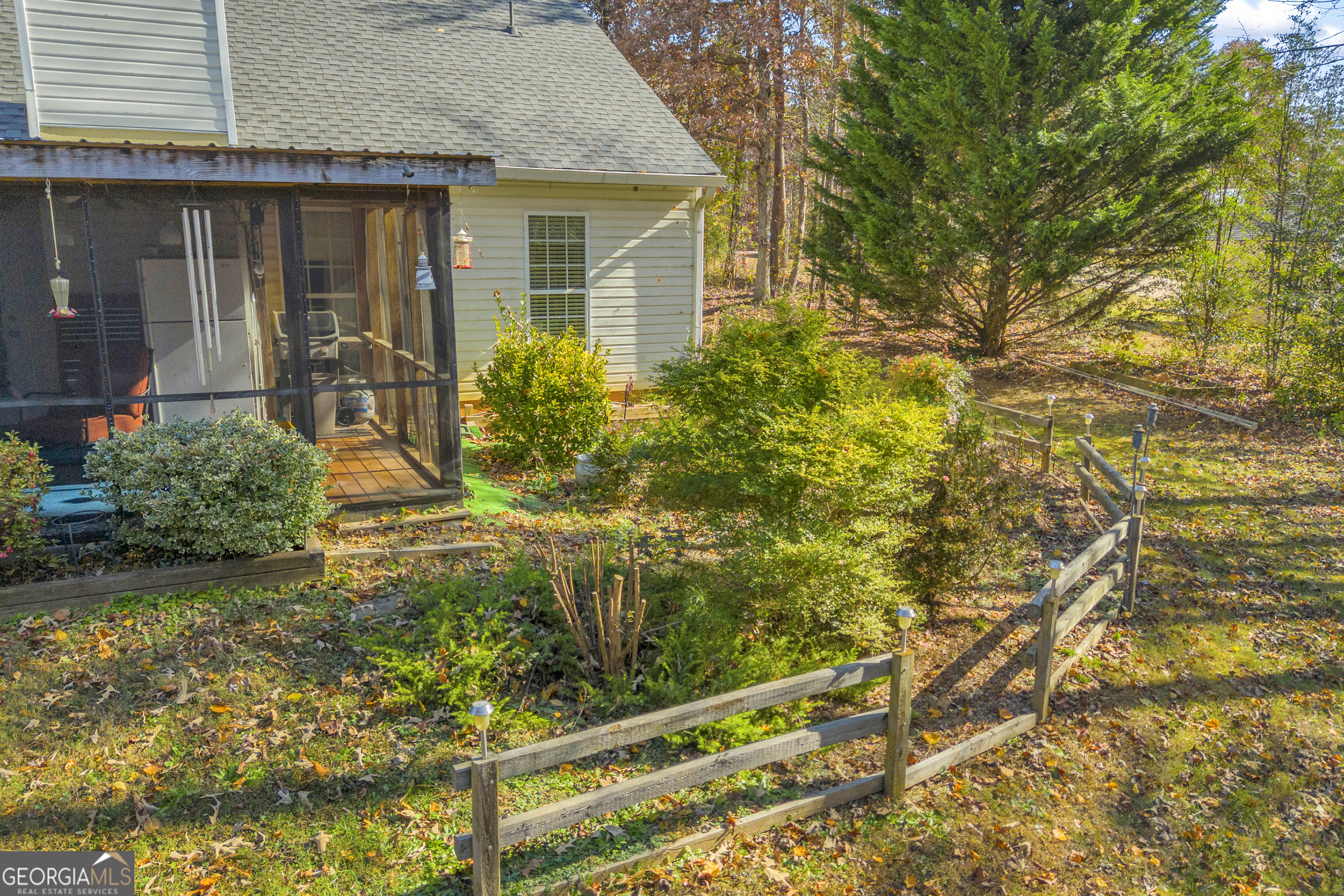357 Sundew Lane Mount Airy, GA 30563 - Photo 2 of 53 a front view of a house with garden