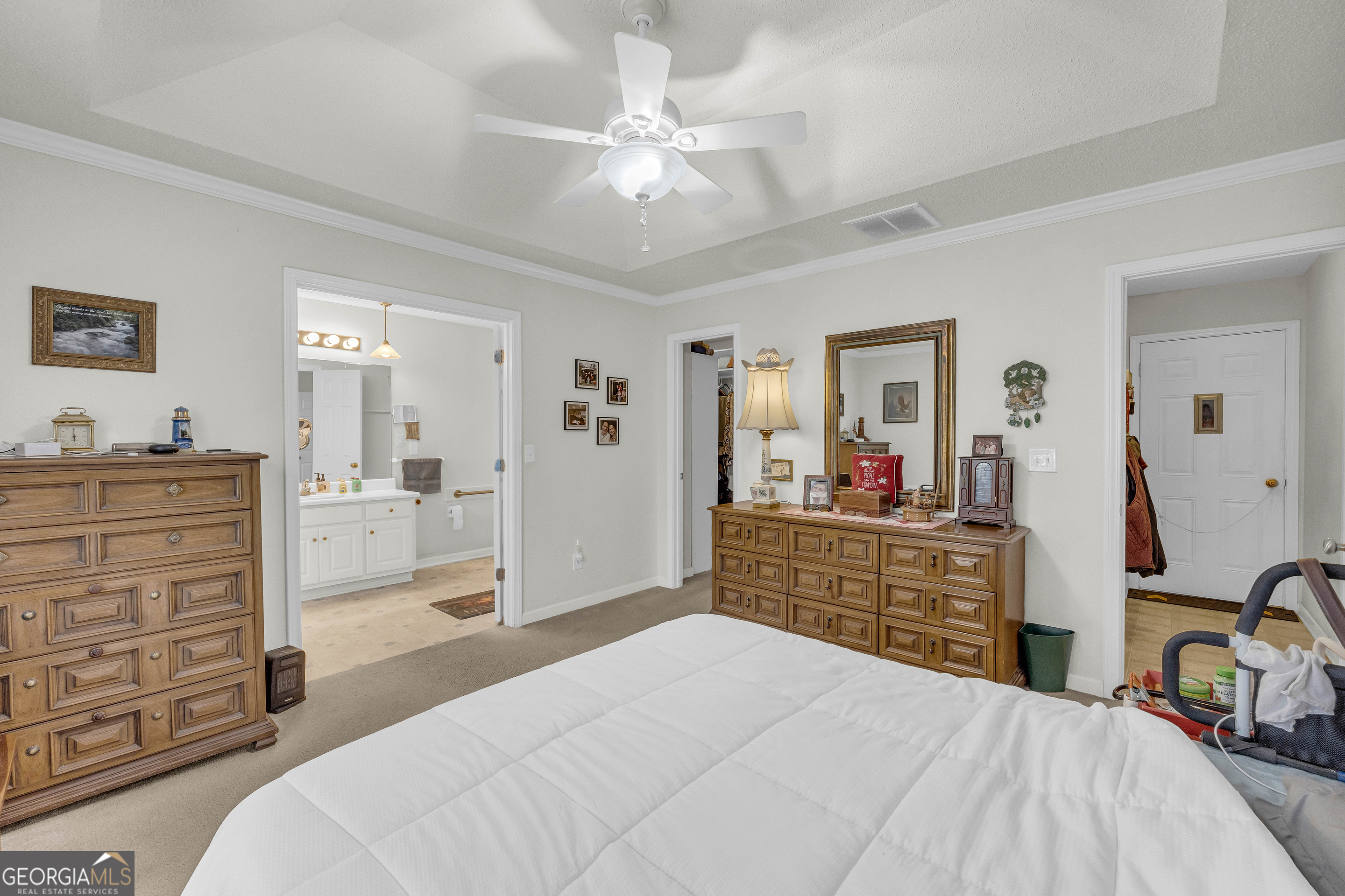 357 Sundew Lane Mount Airy, GA 30563 - Photo 26 of 53 a bedroom with a bed and a dresser