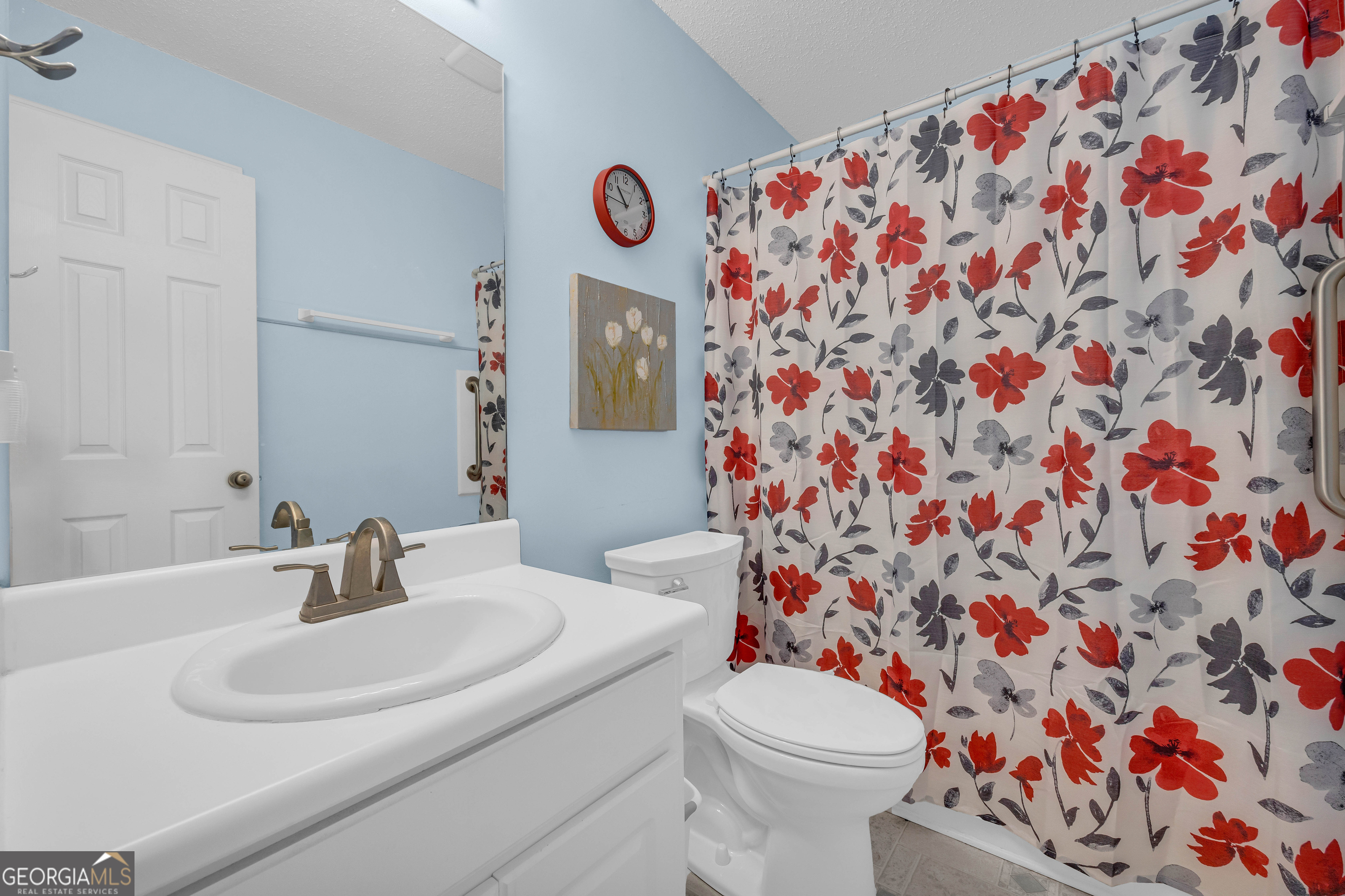 357 Sundew Lane Mount Airy, GA 30563 - Photo 32 of 53 a bathroom with a sink and a toilet