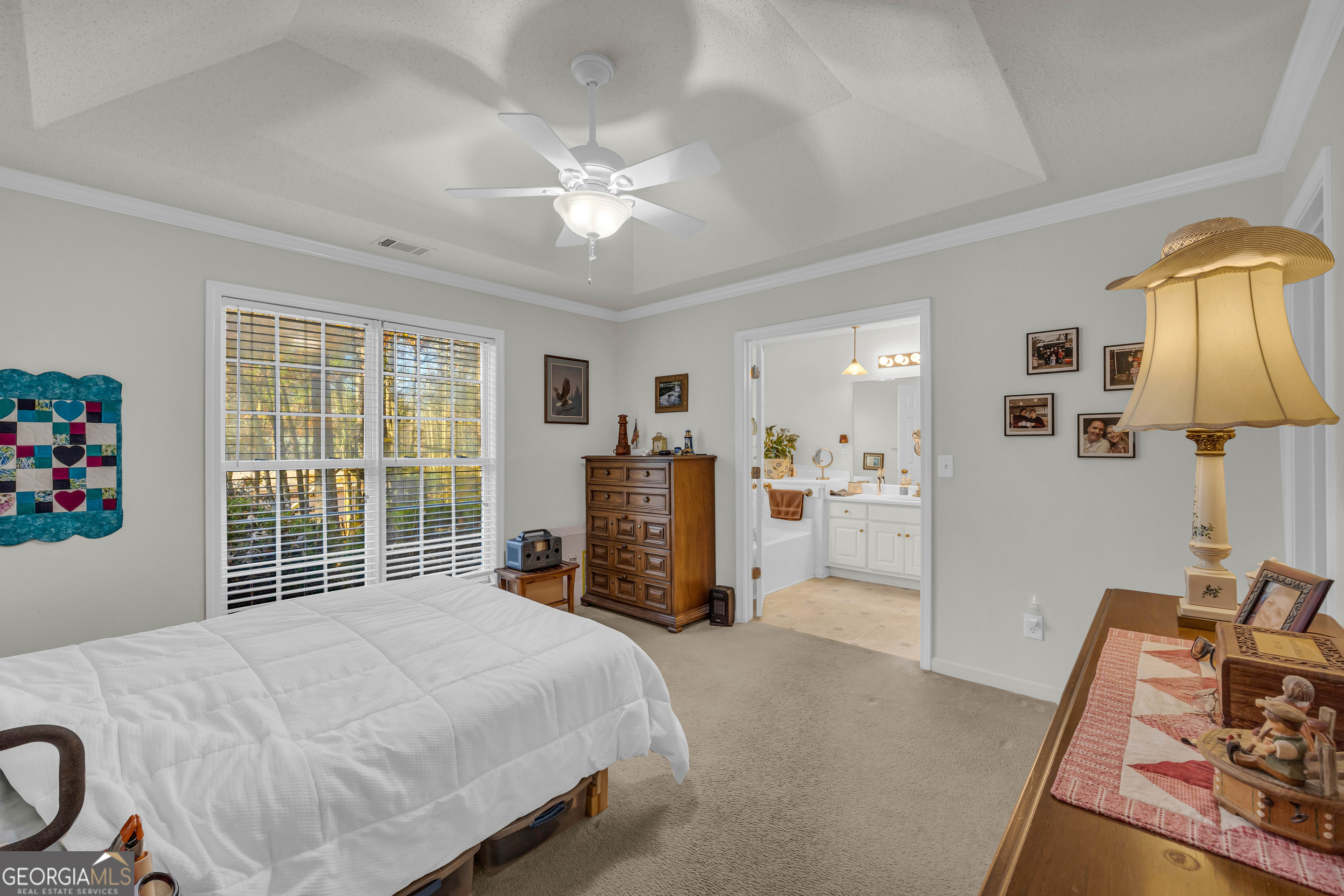 357 Sundew Lane Mount Airy, GA 30563 - Photo 4 of 53 a bedroom with furniture and a window