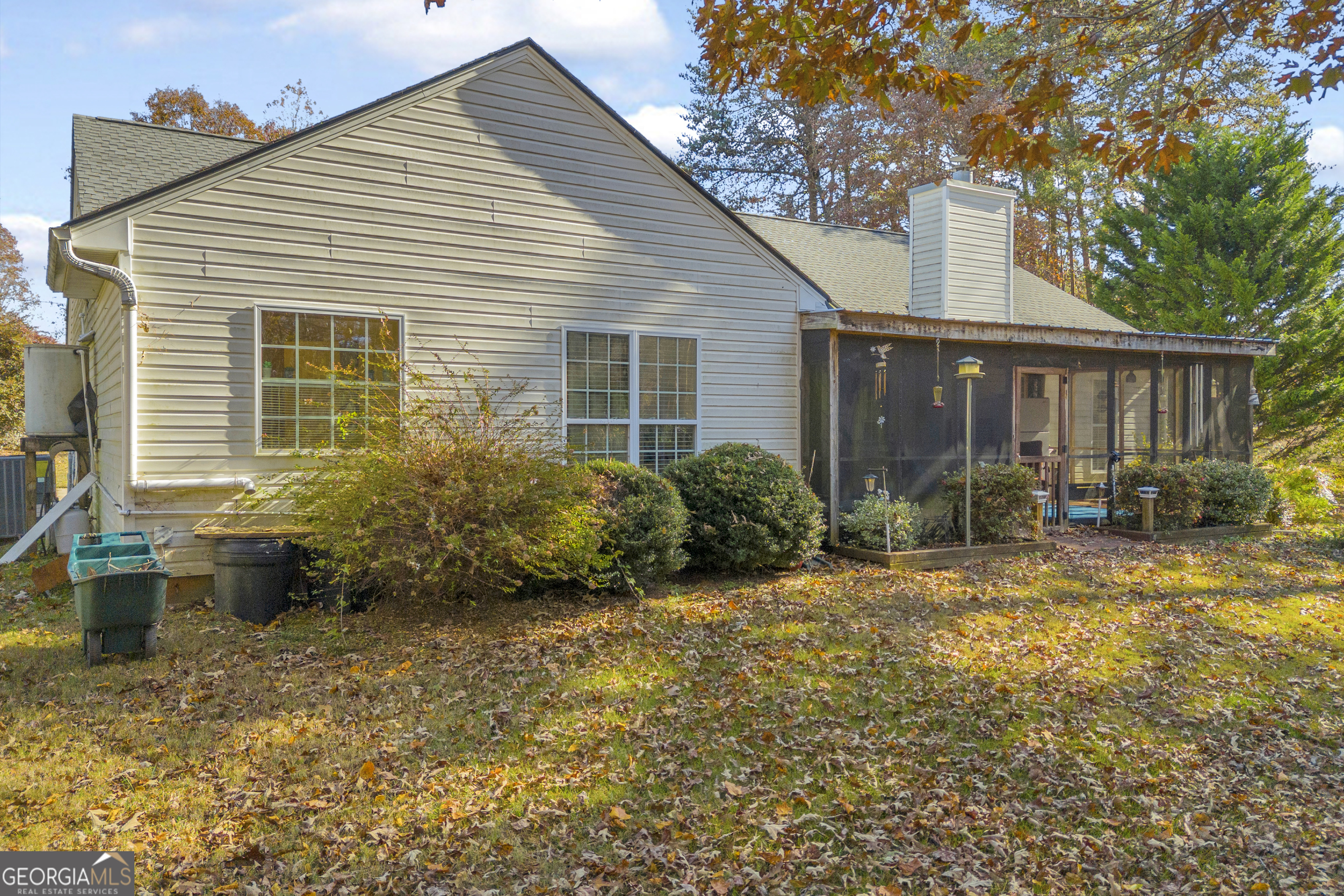 357 Sundew Lane Mount Airy, GA 30563 - Photo 6 of 53 a view of a backyard with plants and large tree