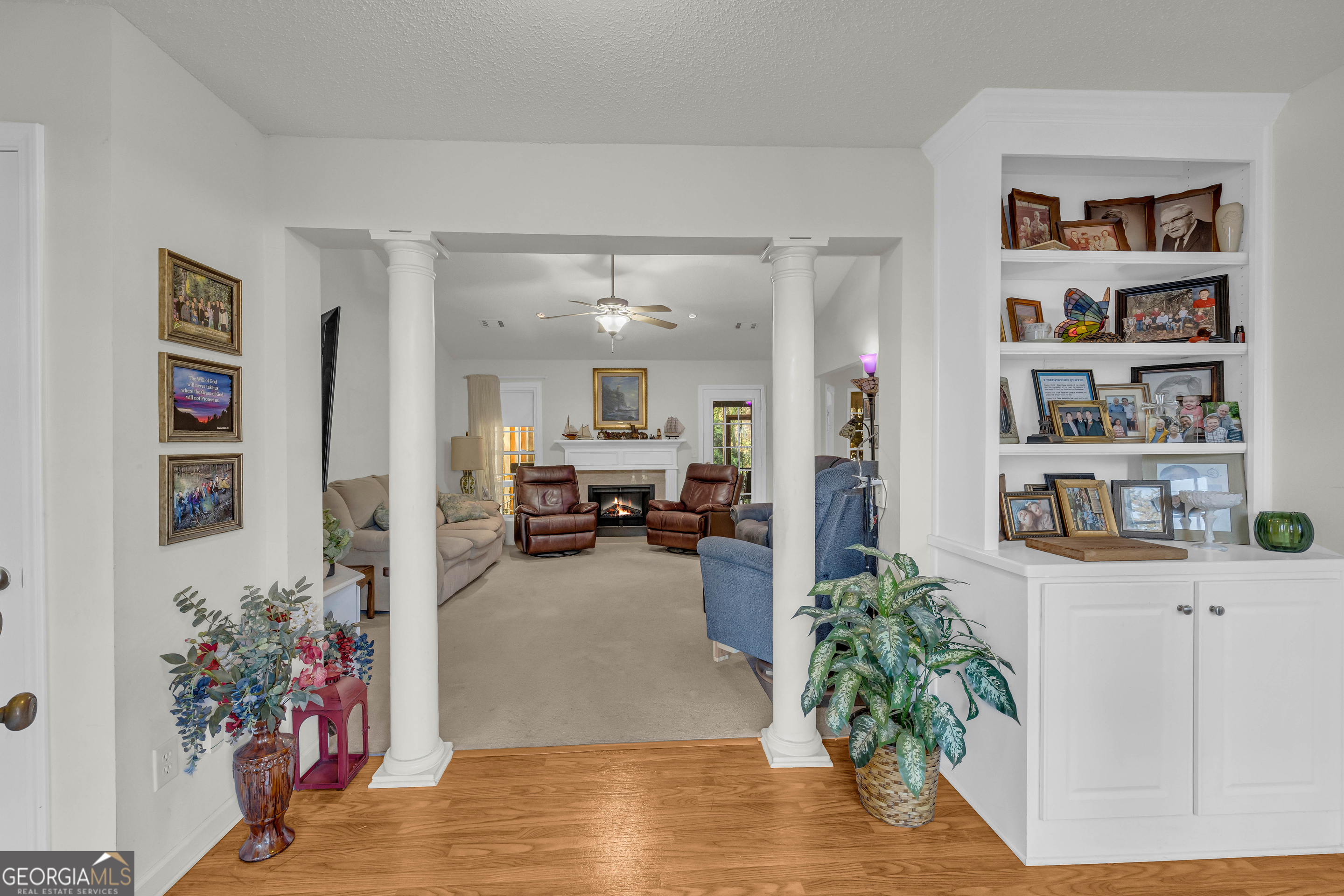 357 Sundew Lane Mount Airy, GA 30563 - Photo 9 of 53 a living room with furniture and flowers