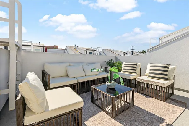 a view of a terrace with seating area