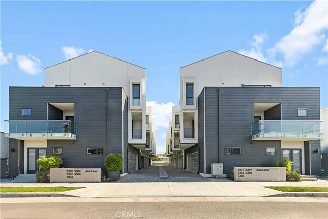 an aerial view of house with yard