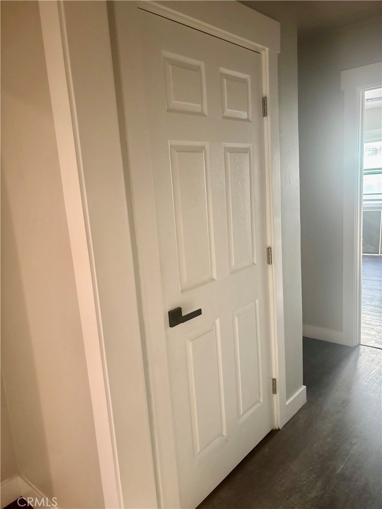 1503 North Chester Avenue Compton, CA 90221 - Photo 4 of 18 a view of a hallway with wooden floor