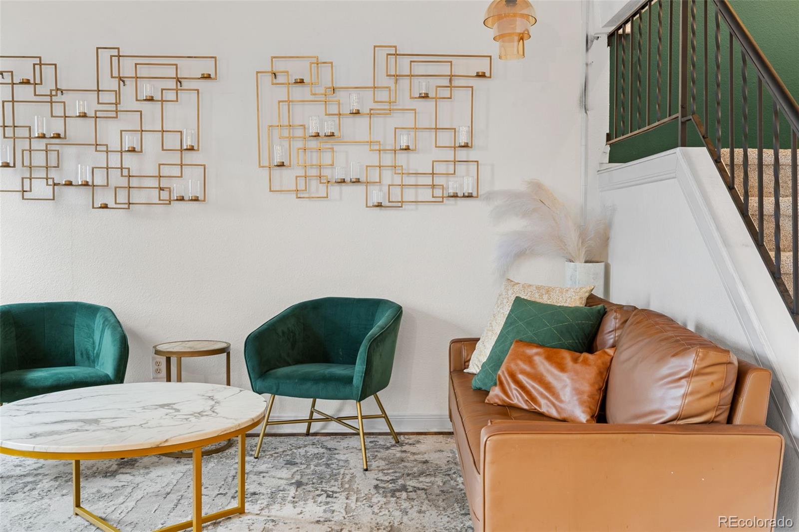 8674 Carr Loop Arvada, CO 80005 - Photo 12 of 43 a living room with furniture and a couch