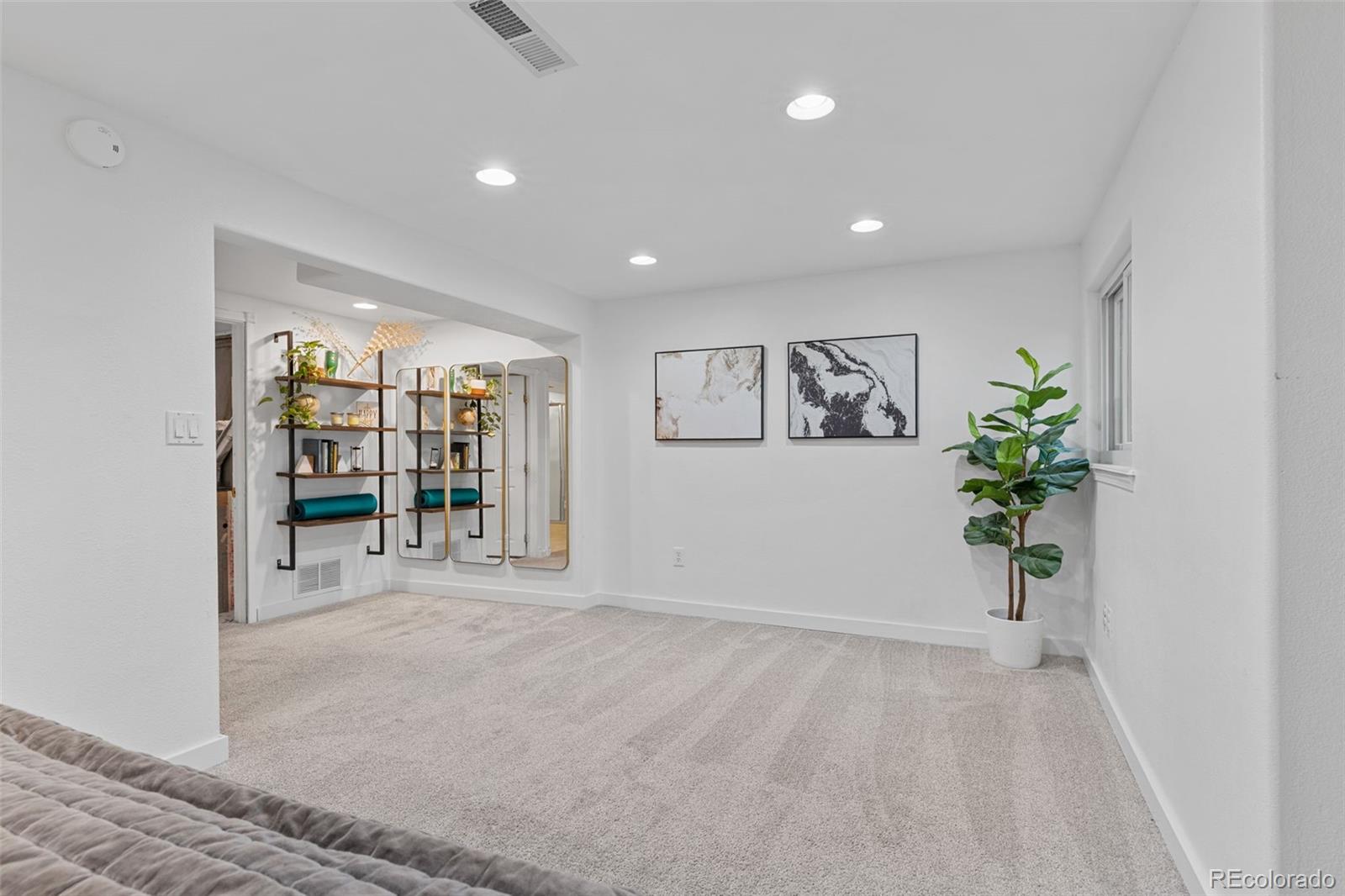 8674 Carr Loop Arvada, CO 80005 - Photo 27 of 43 a view of an empty room with a window