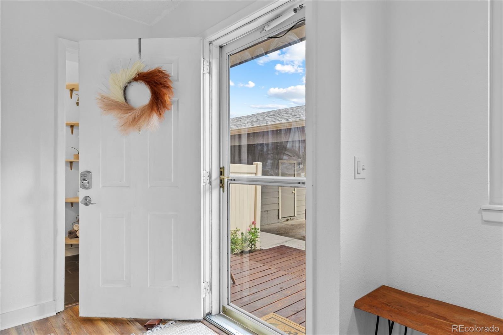 8674 Carr Loop Arvada, CO 80005 - Photo 4 of 43 a bedroom with a bed and a window