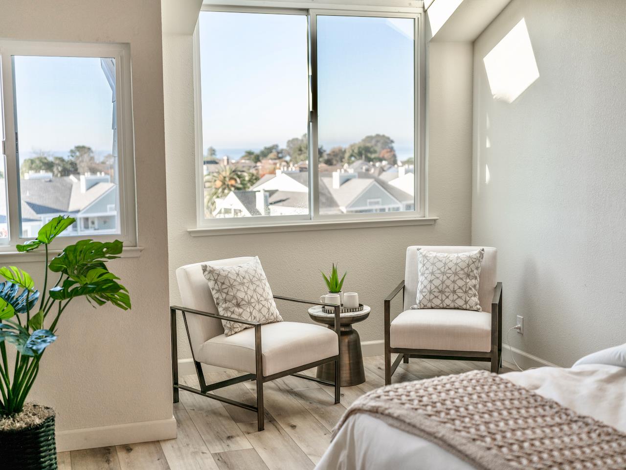 160 Seascape Ridge Drive Aptos, CA 95003 - Photo 12 of 61 a bedroom with furniture and a potted plant