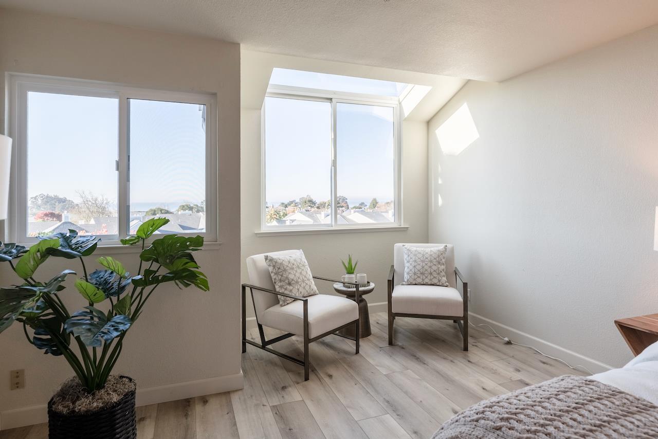 160 Seascape Ridge Drive Aptos, CA 95003 - Photo 14 of 61 a living room with furniture and a potted plant