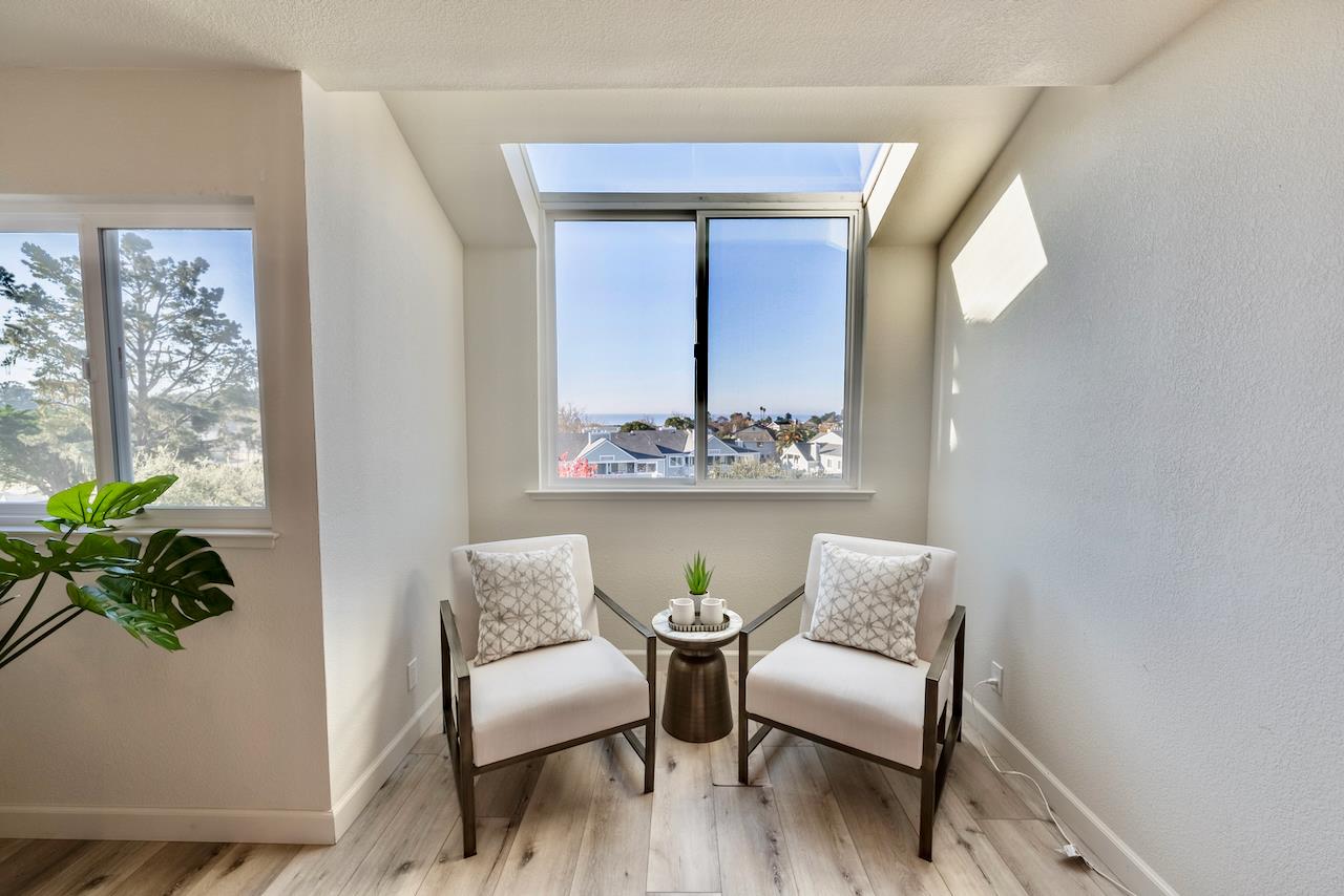 160 Seascape Ridge Drive Aptos, CA 95003 - Photo 16 of 61 a view of a hallway with furniture and a potted plant