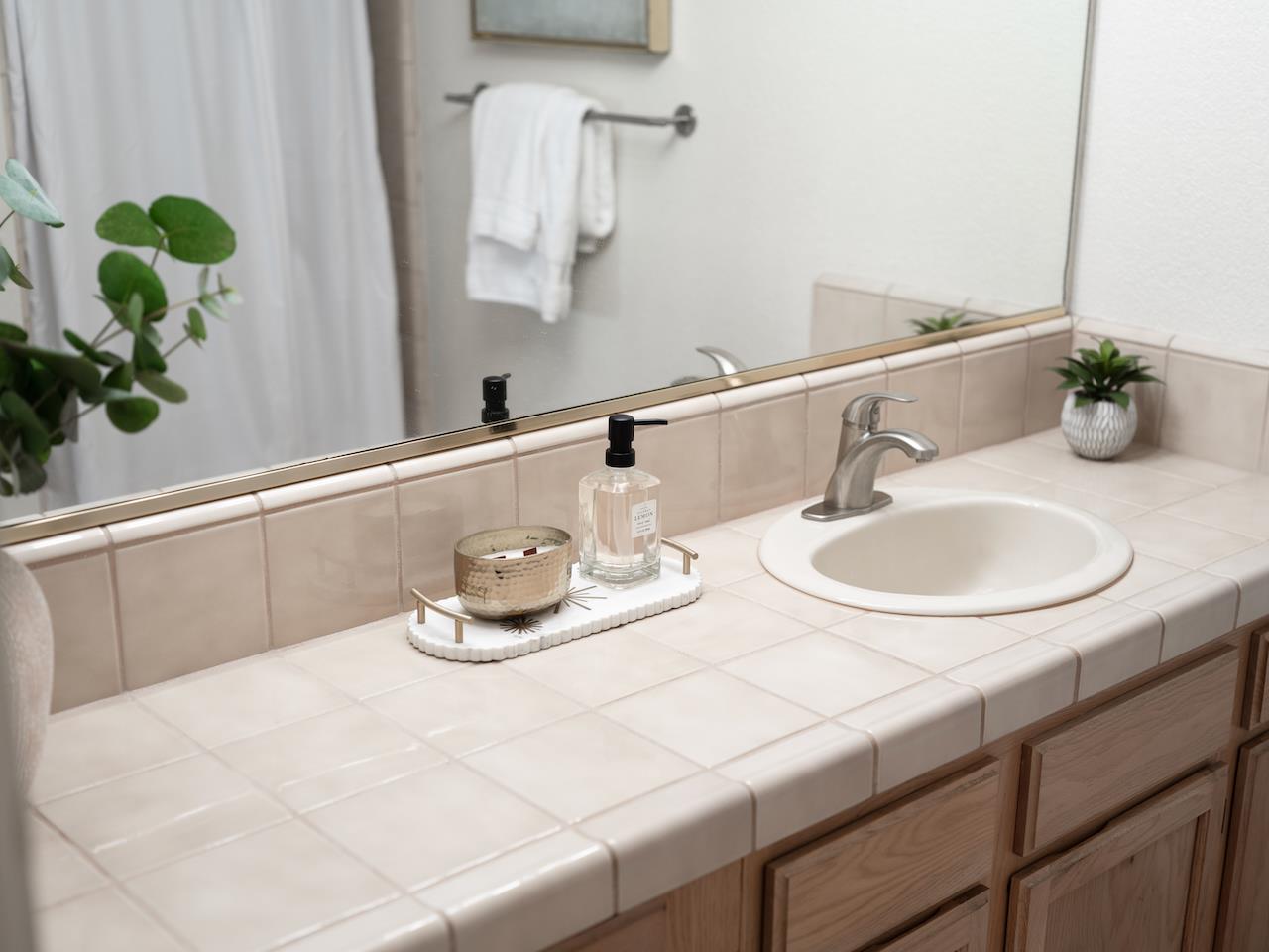 160 Seascape Ridge Drive Aptos, CA 95003 - Photo 21 of 61 a bathroom with a sink and a mirror