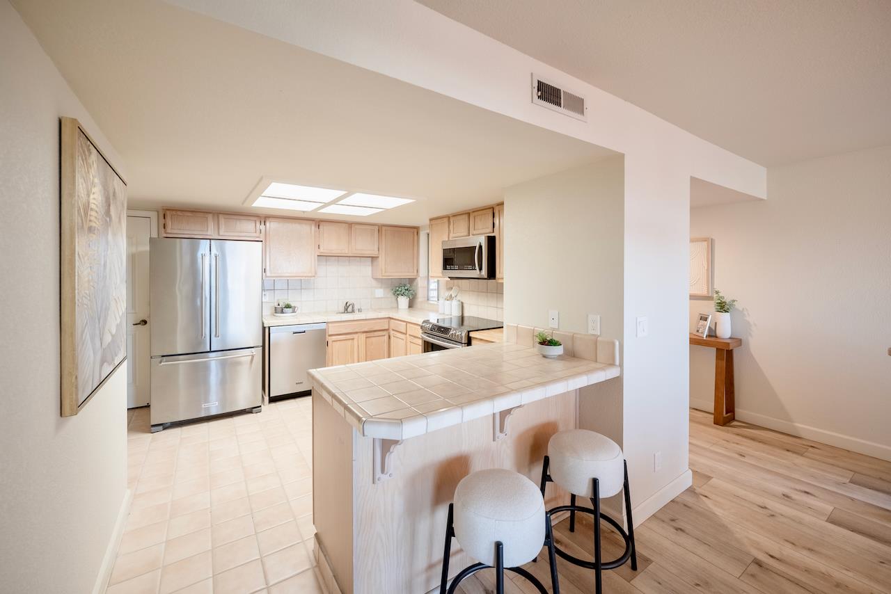 160 Seascape Ridge Drive Aptos, CA 95003 - Photo 23 of 61 a kitchen with a sink a counter space and stainless steel appliances
