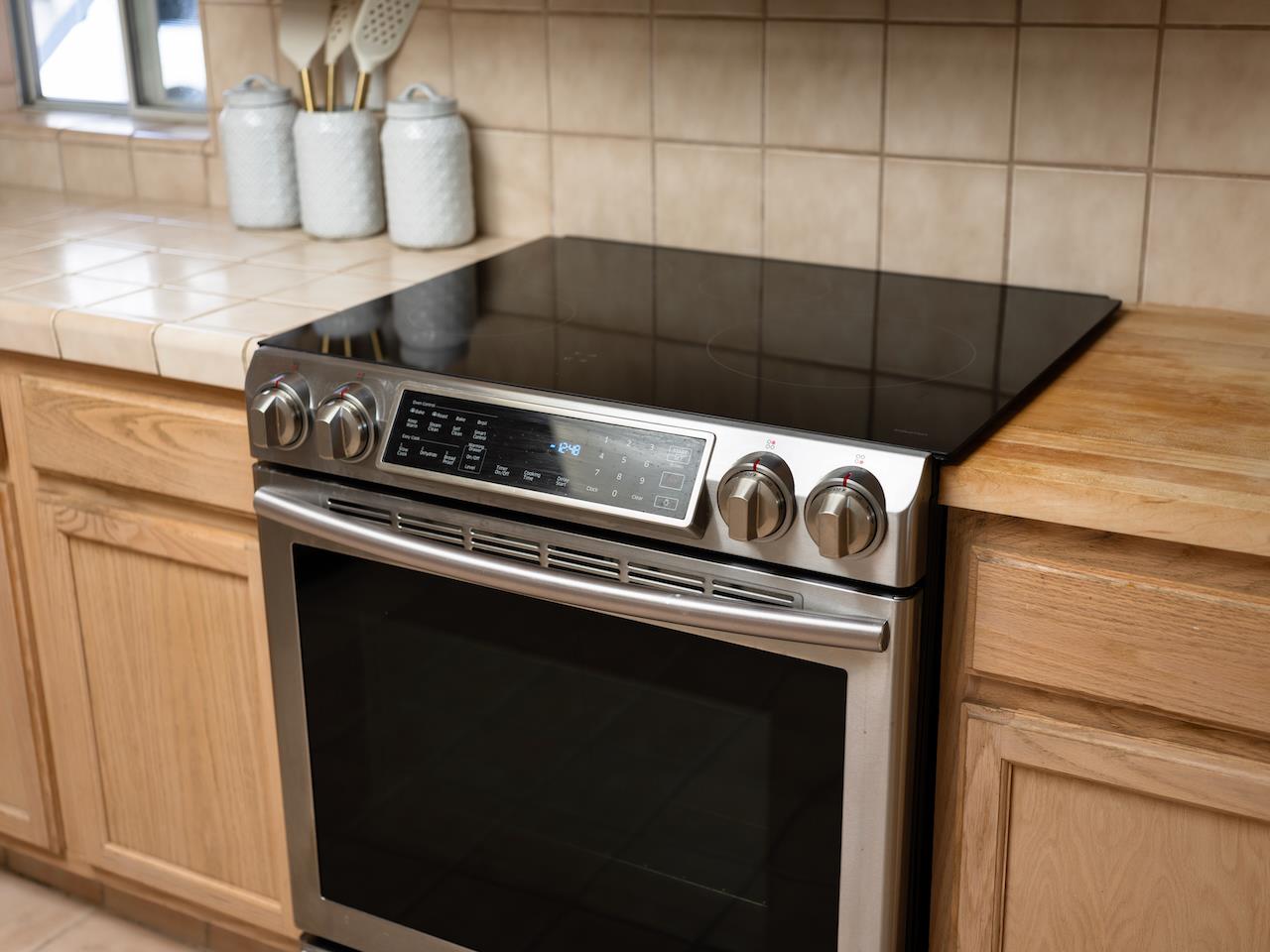 160 Seascape Ridge Drive Aptos, CA 95003 - Photo 25 of 61 a stove top oven sitting inside of a kitchen