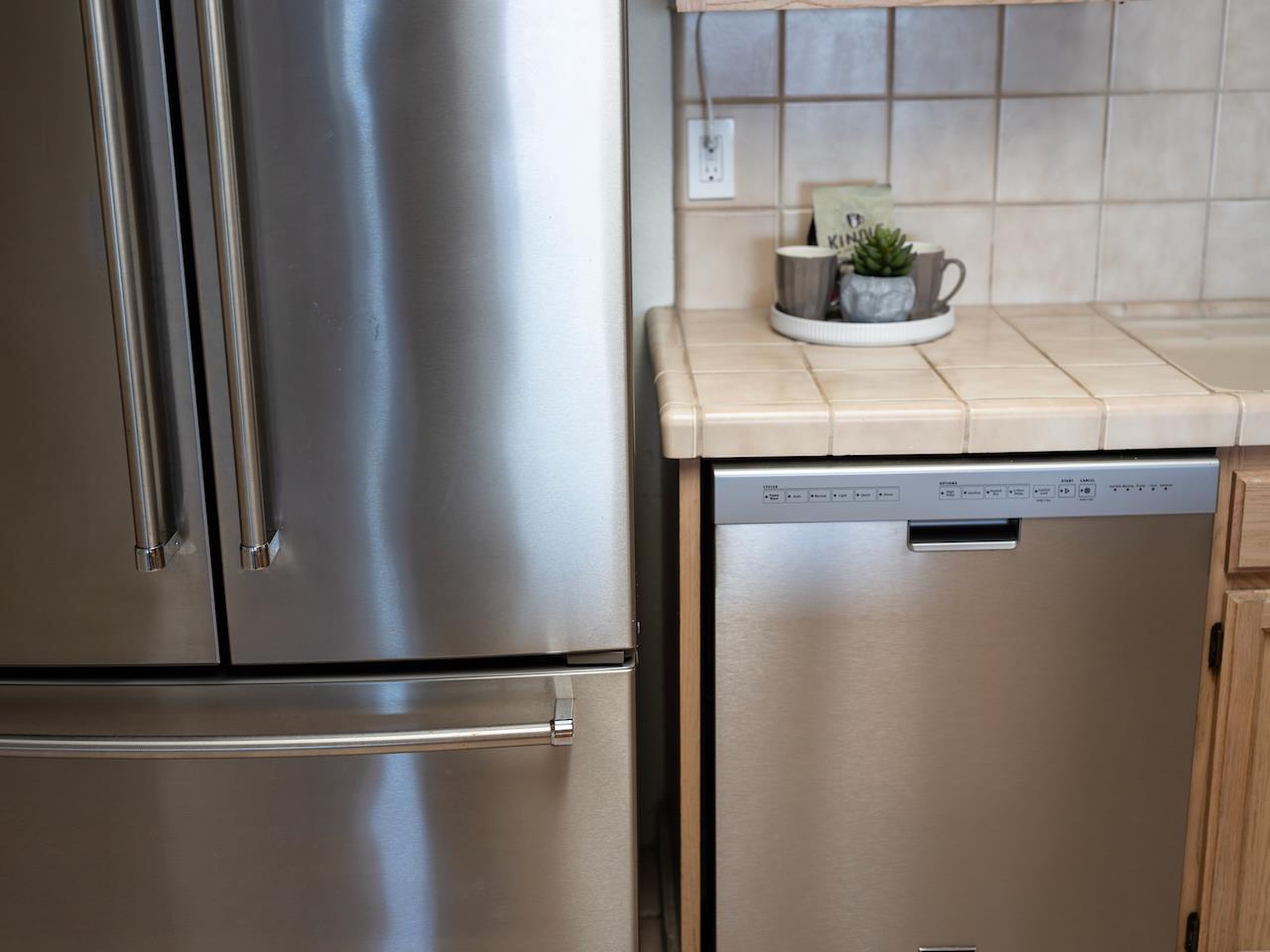 160 Seascape Ridge Drive Aptos, CA 95003 - Photo 26 of 61 a view of a refrigerator a counter top space and cabinets