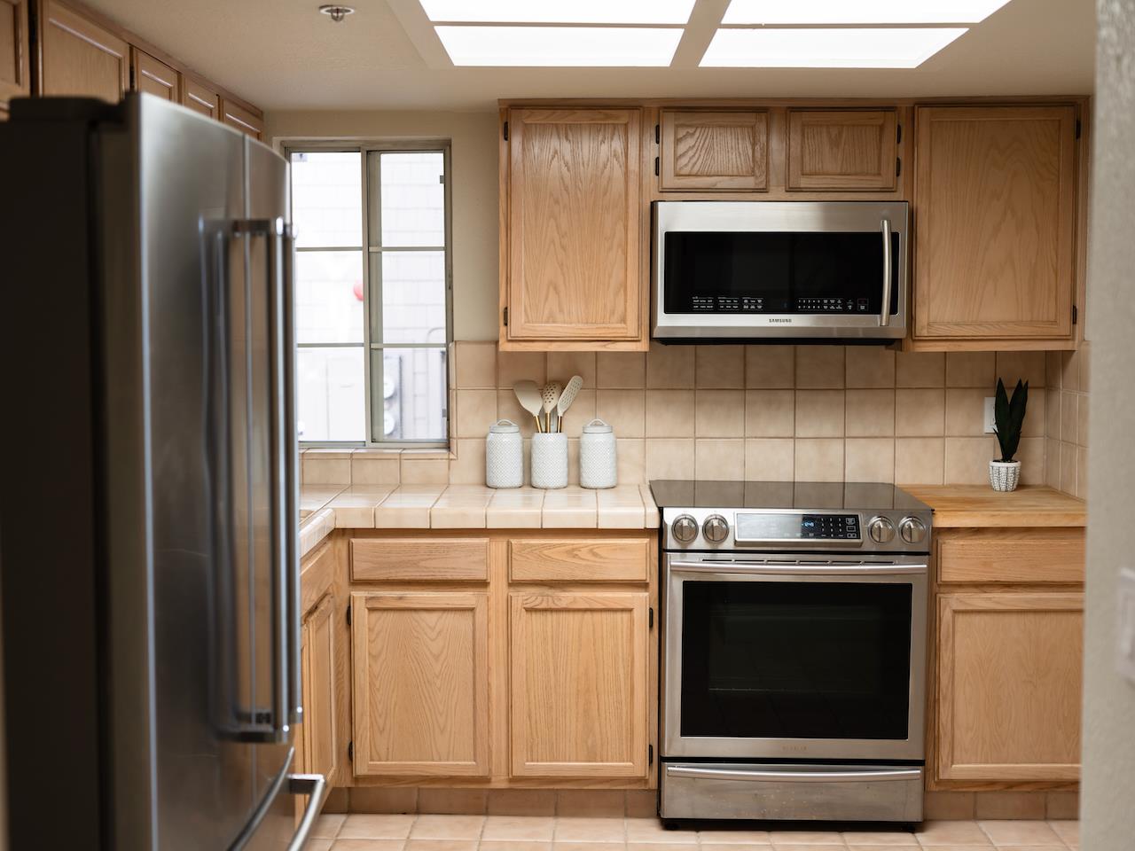 160 Seascape Ridge Drive Aptos, CA 95003 - Photo 27 of 61 a kitchen with a stove and a microwave