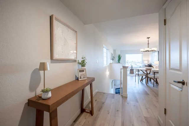 a living room with furniture and a table